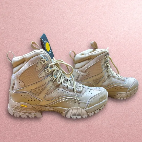 Armada boots by FILA Men size:7 Women size: 8.5 Excellent grip with cushions New