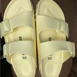 Birkenstock Women’s 6Buttercup Yellow Slides