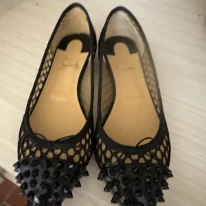Christian Louboutin Black Flats with Intricate Design