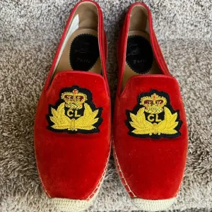 Christian Louboutin Unisex Red Velvet Loafers with Embroidered Crest
