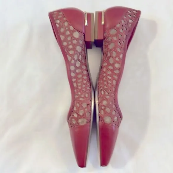 EMY MACK RUST COLORED CUT OUT FLATS.  NICELY PADDED.  NEW IN BOX