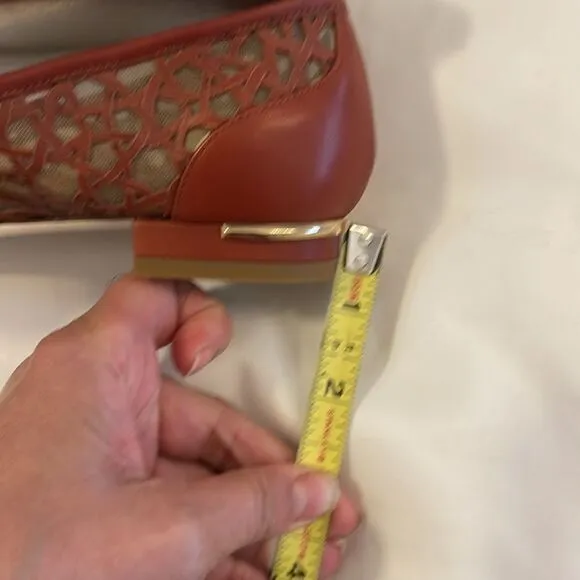 EMY MACK RUST COLORED CUT OUT FLATS.  NICELY PADDED.  NEW IN BOX