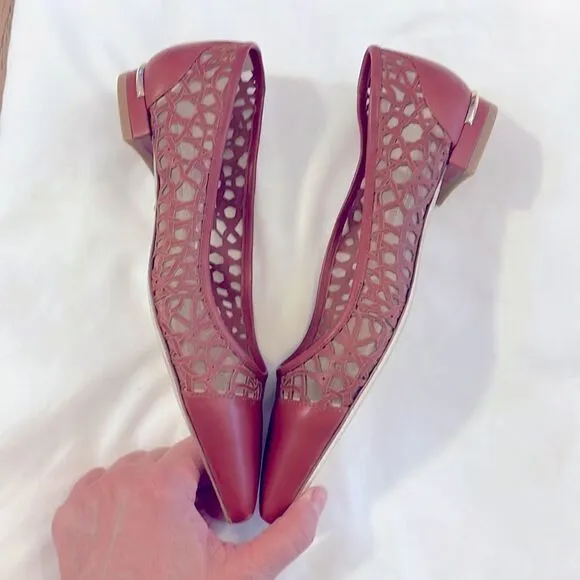 EMY MACK RUST COLORED CUT OUT FLATS.  NICELY PADDED.  NEW IN BOX