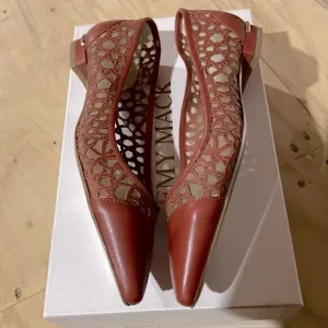 EMY MACK RUST COLORED FLATS.  NEW