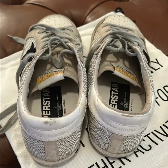 Golden Goose Superstar sneakers  cream with black star with mesh detail.
