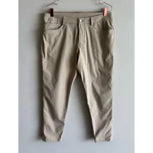 Lululemon Mens ABC Classic Fit 5 Pocket Slim Fit Warpstreme Pants Beige Sz 33