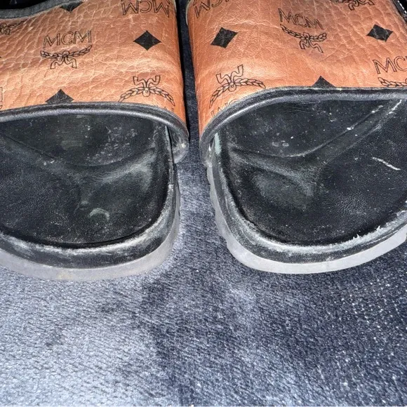 MCM Tan and Black Logo Slides