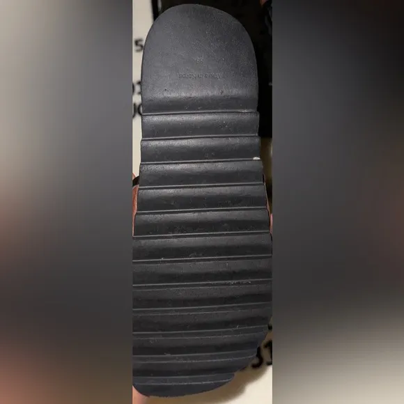 MCM Tan and Black Logo Slides