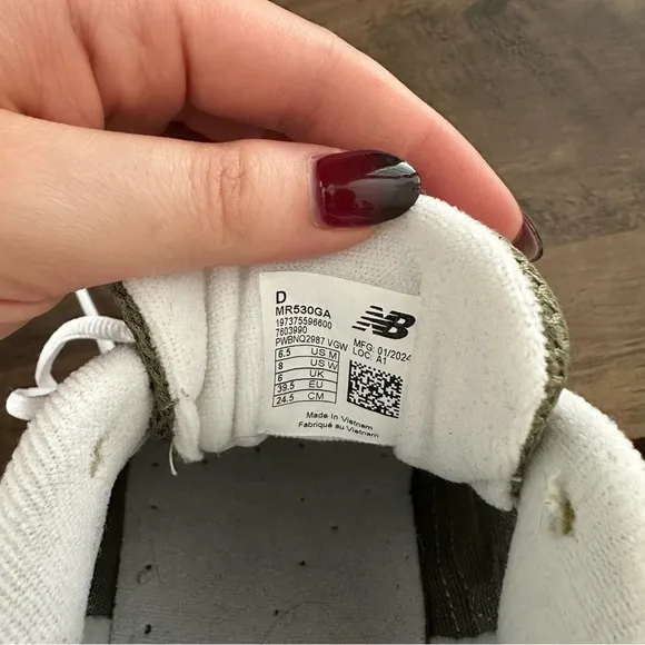 New Balance Olive and White Sneakers