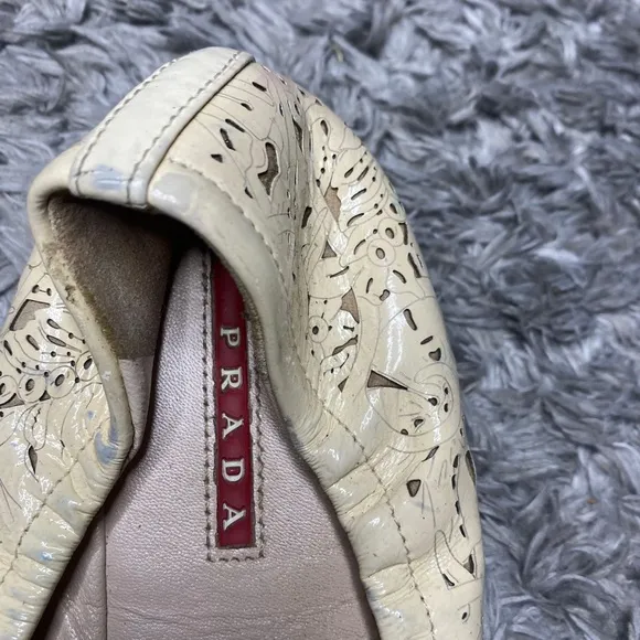 Prada Ivory Patent Leather Cut-Out Ballet Flats