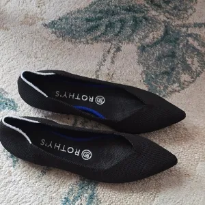 Rothy's Black Flats Elegant Minimalist Design